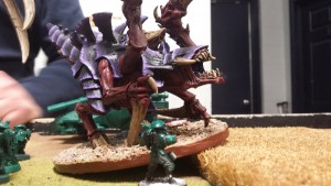 The lone firewarrior tries to delay the hierodules inevitable charge
